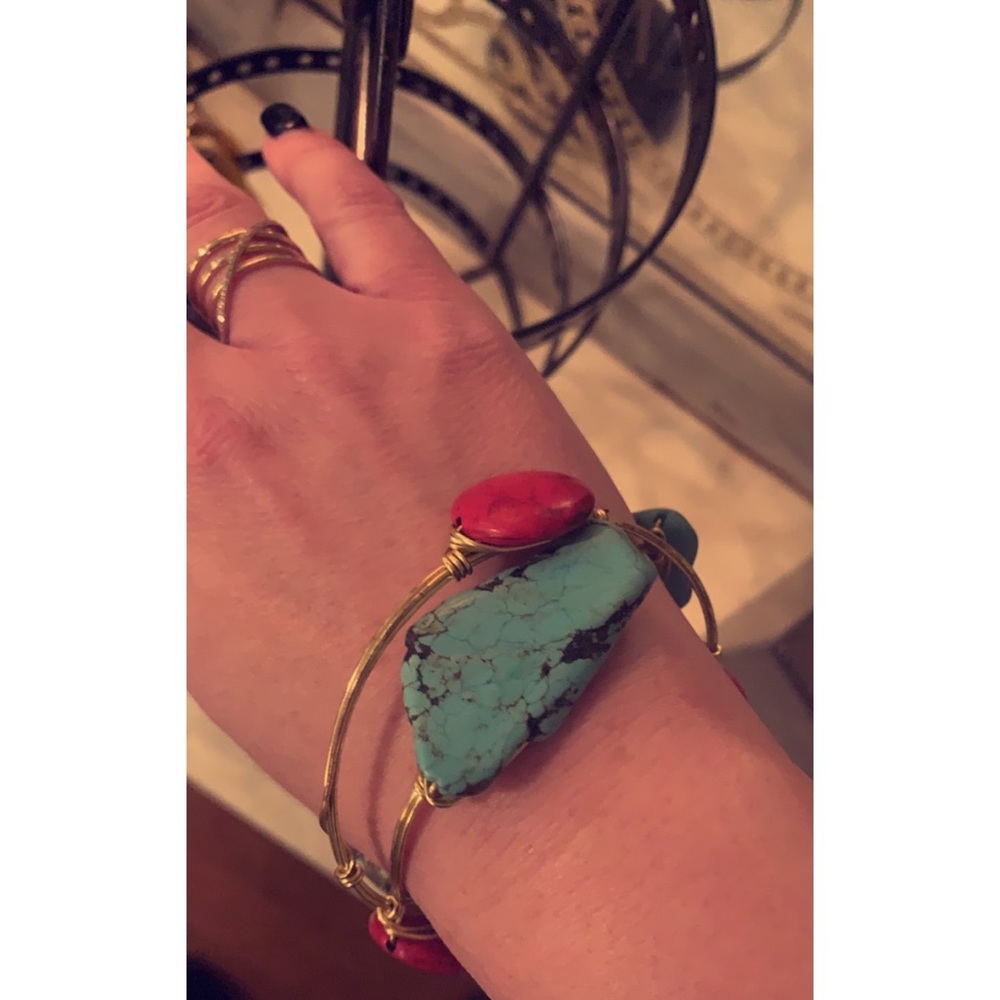 Gold bracelets with turquoise and red stones